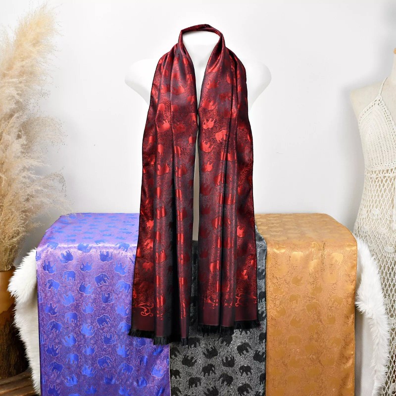 AeraVida Elegantly Stunning Hand Woven Red and Black Silk Elephant