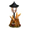 Solar-Powered Bunny Family Reading Statue with LED Lantern and Roses,