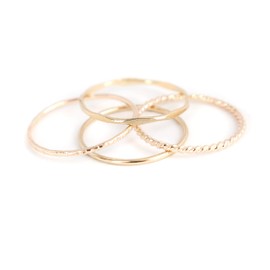 gold stacking rings. SET of FOUR. 14k gold filled metal stack rings. minimalist rings. stackable gold rings. twist, hammered, stardust, smooth.