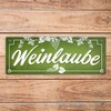 Wine Metal Sign with Vines Motif and Saying "Weinlaube -