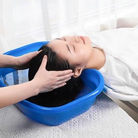 Simple aged patient elderly pregnant woman lying down washing hair basin bucket single item