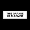 This garage is alarmed Plastic Door Sign with 4 Pre-Drilled
