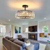 DAFKOS 4 Lights Modern Crystal Chandelier Black Round Semi Flush