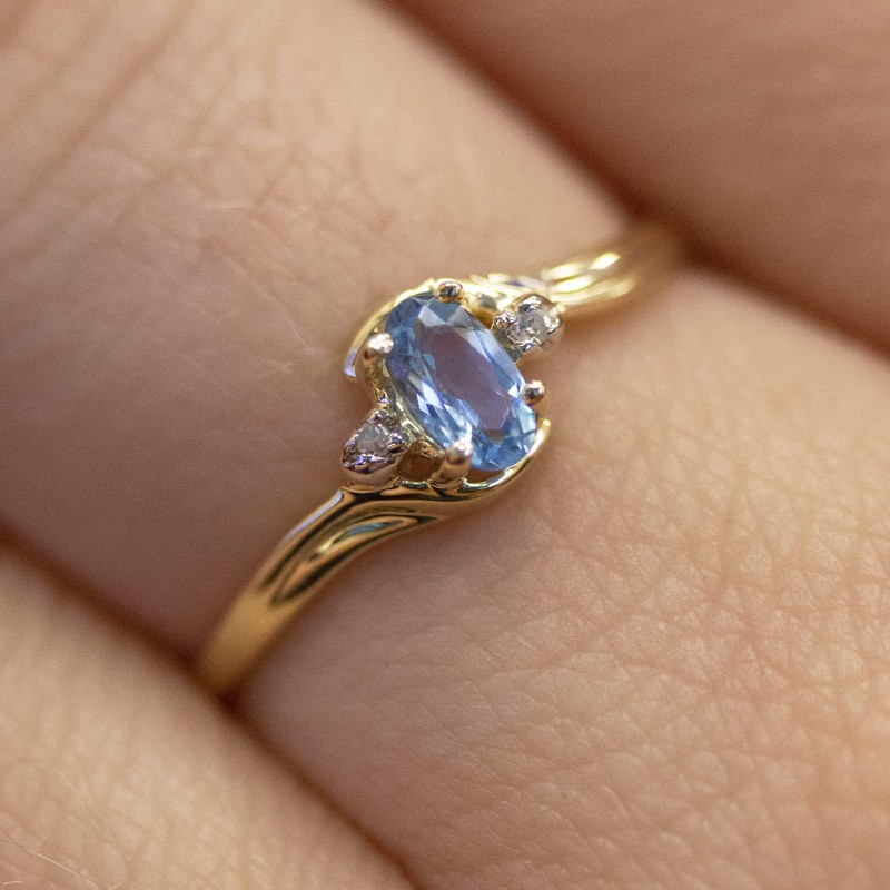 14k Yellow Gold Oval Blue Topaz And Diamond Ring (Size