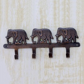 NOVICA Artisan Handmade Brass Key Holder Antiqued Elephants on Copper Plated India Wall Decor Coat Holders Animal Themed [3.1in H x 7.75in W x 1.4in D] ' Adventurous Elephants'