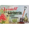Geschenkeparadies 24 Tin sign with German language text: Vorsicht vor