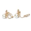 Pink bow with faux pearl clip on earrings
