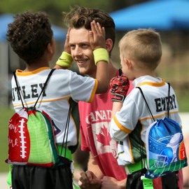 Woanger 30 Pcs Football Party Favors Bags Drawstring Football Gift Bags Fabric Print Candy Goodie Snacks Treat Backpacks for Sports Theme Birthday Party Supplies 10 x 11 Inch