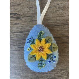Handmade felt Easter decoration Easter egg with yellow flower