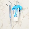 LoveInUsa Toothpaste Tube Squeezer Dispenser, Hanging Toothpaste Clips Holder Rolling