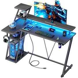 Korfile 47 Inch Gaming Desk with LED Lights & Power Outlet, L Shaped Computer Desk with Storage Shelves, Gamer Workstations with Monitor Stand for Bedroom, Carbon Fiber Black