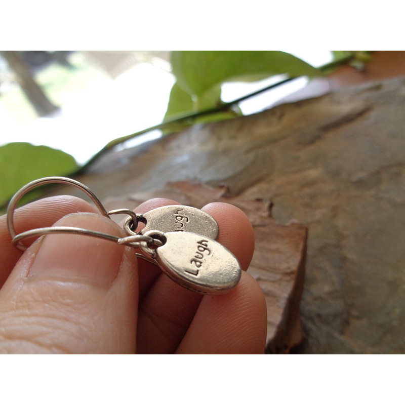 Laughing silver oval thick plates on long self-curved hooks