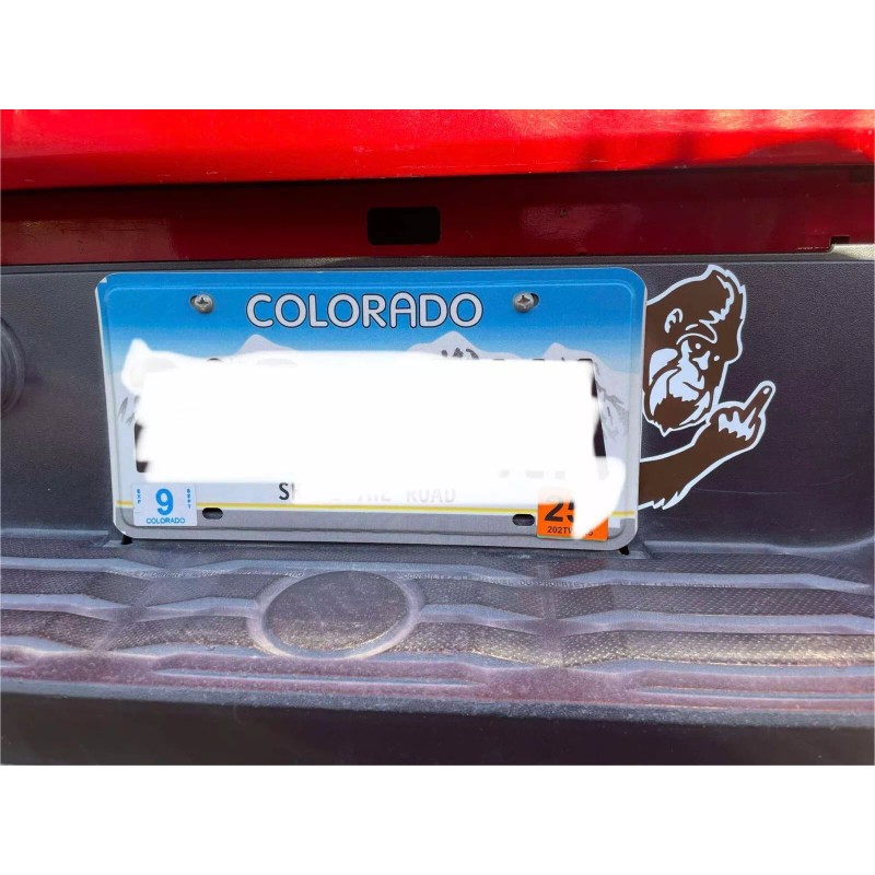 719 Designs Bigfoot giving finger looking around license plate Die-Cut