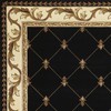 HomeRoots 2' X 3' Black Machine Woven Hand Carved Fleur
