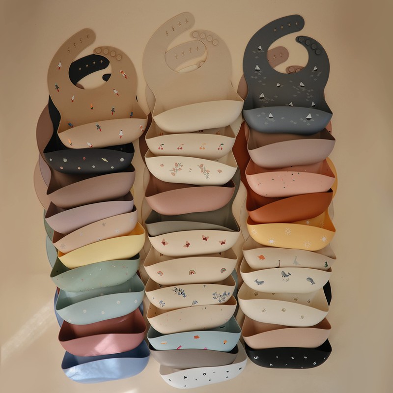 mushie Silicone Baby Bib | Adjustable Fit Waterproof Bibs (Powder