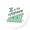 CafePress X is for Xylophone 5.5" Round Car Magnet Magnetic