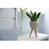 Decorasian Flower pot with integrated stand, braided from seagrass -