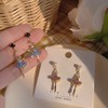 arete largos con incrustaciones de diamantes de imitación, diseño de