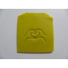 Hands into a heart stamp for many uses soap making