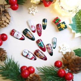 24Pcs Christmas Press on Nails Medium Almond Fake Nails with Cute Santa Claus Candy Canes Design Xmas Red Green Elk Gingerbread Man Snowman False Nail Tips Handmade Nails for Women