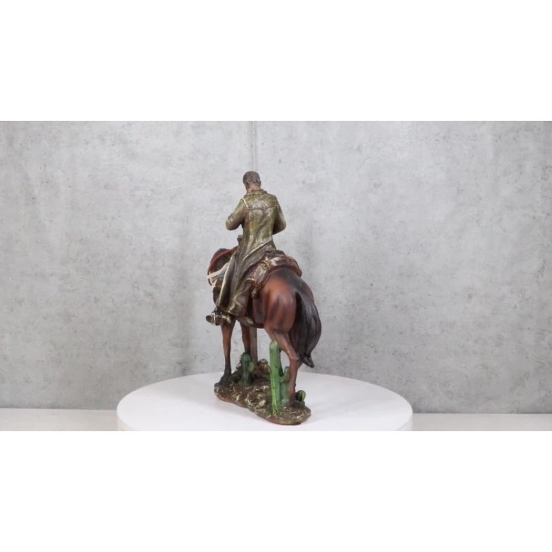 Western Cowboy in Solemn Prayer On Horse By Faded Cross