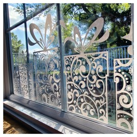 Hanging Gift and Gift Border Window Clings for Windows and Glass. Christmas Window Decal Decorations. Festive Winter Home Decor Stickers. No Adhesive. Reusable. Made in America. (Gift Border)