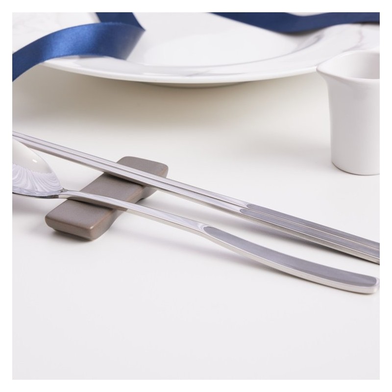 Pristine pastel-colored premium quality domestic cutlery set with good grip,