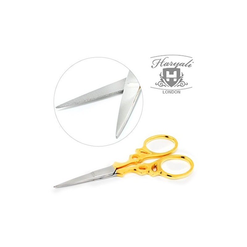 Stainless steel nail and cuticle scissors with golden handle