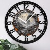 25cm Circular Iron Wall Clock with a Fern Frond Unfurling