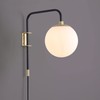 Caserti Plug-in Globe Wall Lamp | Black with Satin Brass
