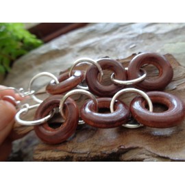 ◦ ● Extra long earrings made of wood and metal rings on 925 silver ear hooks. • ◦ very long earrings made of three wooden rings and metal rings