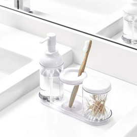 iDesign Liquid Bathroom, Plastic 4-Piece Set, Sink Caddy with Soap Dispenser, Toothbrush Holder, Pot with Lid and Organiser Tray, White/Clear, 22.4 cm x 8.1 cm x 19.8 cm