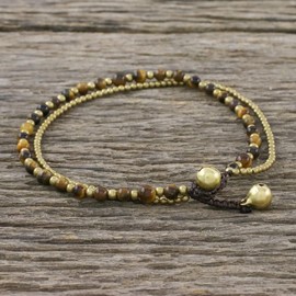 NOVICA Artisan Handmade Tigers Eye Beaded Anklet Brass from Thailand [9.25 in min L x 9.75 in max L x 0.3 in W] ' Ringing Beauty'