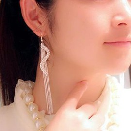 Yienate Long Crystal Tassel Dangle Earrings Silver Curved Crystal Drop Earrings Crystal Statement Wedding Earrings Sparkly Prom Rhinestone Earrings Jewelry for Women and Girls