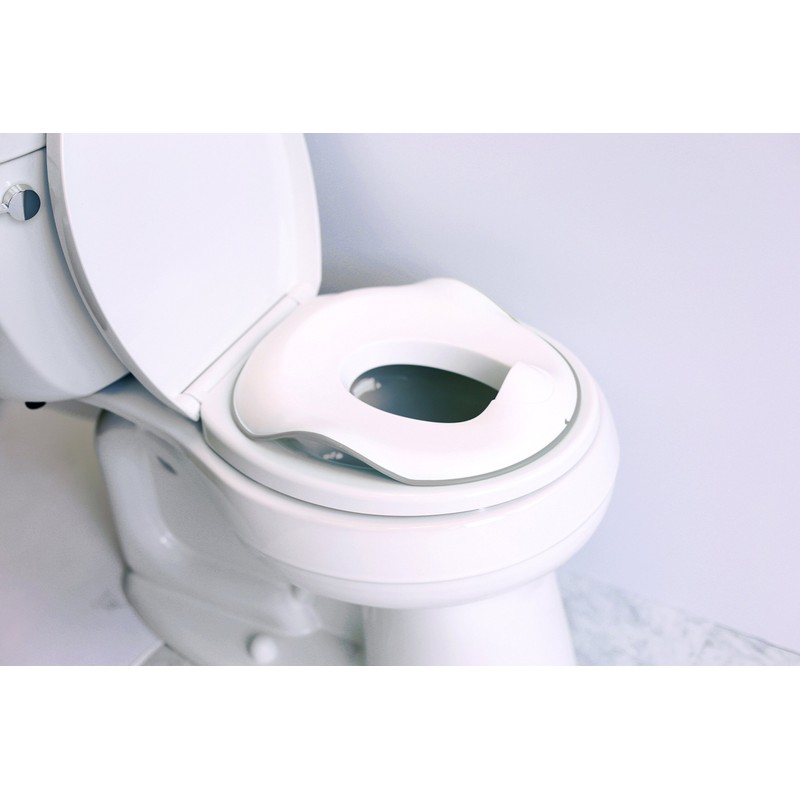 Ubbi Adjustable Toilet Trainer with Built-In Handles and Included Potty
