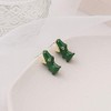 Divertidos aretes de dinosaurio con diseño de dinosaurio verde con
