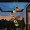 ‌Solar-Powered Hummingbird Feeder with Wind Chime Elegance – 6 Leak-Proof
