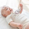 Ryan & Rose Juguete mordedor acoplable Cutie Clinks para bebés