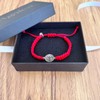 Pulsera de San Benito de Plata ley 925, roja tejida