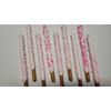 Gender Reveal Pink Chocolate Pretzel Rods with Pink Sprinkles and