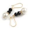 Stylish Black/White Glass Bead Drop Earrings With Gold Tone Bean