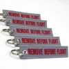 Rotary13B1 - Remove Before Flight Keychain - Gray/Red 5pcs