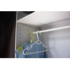 TEKTEK Color Box Secures the Rod to a Hanger Rack