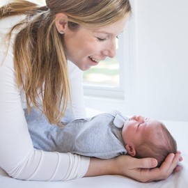 The Original Woombie Baby Swaddle Blanket, Cool Blue Mustache, 5-13 lbs