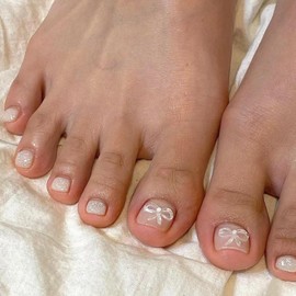 3D Bowknot Square False Toenail Short French Press on Toenails Glossy Nude Pink Acrylic Stick on Toenails Full Cover Artificial Silver Glitter Fake Toenails for Women Girls Nail Art Decorations 24Pcs