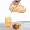 Guzzini - Caraffa con coperchio in bio-based plastic, ambra, DOLCEVITA