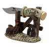 Western Horse Saddle By Wagon Wheel With Blunt Knife Display
