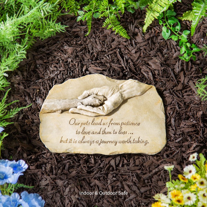 Evergreen Garden Dog Paw in Hand Devotion Painted Polystone Stepping