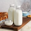 Dwbligt 32 oz Reusable Glass Milk Bottles with Silicone Dispenser