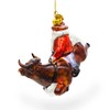 Daring Santa Riding a Bull on The Rodeo Blown Glass